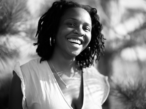 Amara smiling in natural light